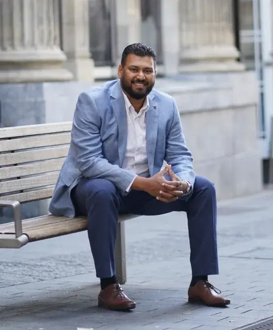 Mohan Herath, seated